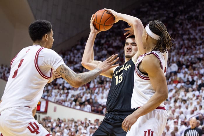 Purdue Boilermakers center Zach Edey (15) looks to shoot the ball while Indiana Hoosiers center Kel'el Ware (1) and forward Malik Reneau (5) defend in the second half at Simon Skjodt Assembly Hall.